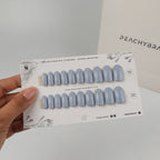 Hazy Blue reusable press-on nails for an at-home manicure