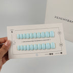 Bliss Blue reusable press-on nails for an at-home manicure