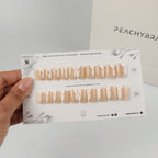 Swirl White press-on nail set of 20 in standard sizes