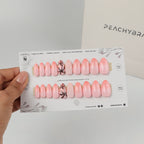 Pink Lagoon press-on nails in almond shapes