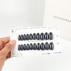 Charcoal Blue reusable press-on nails for an at-home manicure