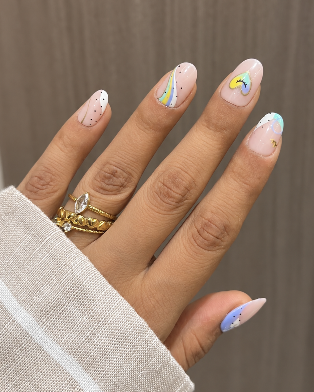 Pastel Picnic press-on nails in almond, coffin, oval, round and square shapes