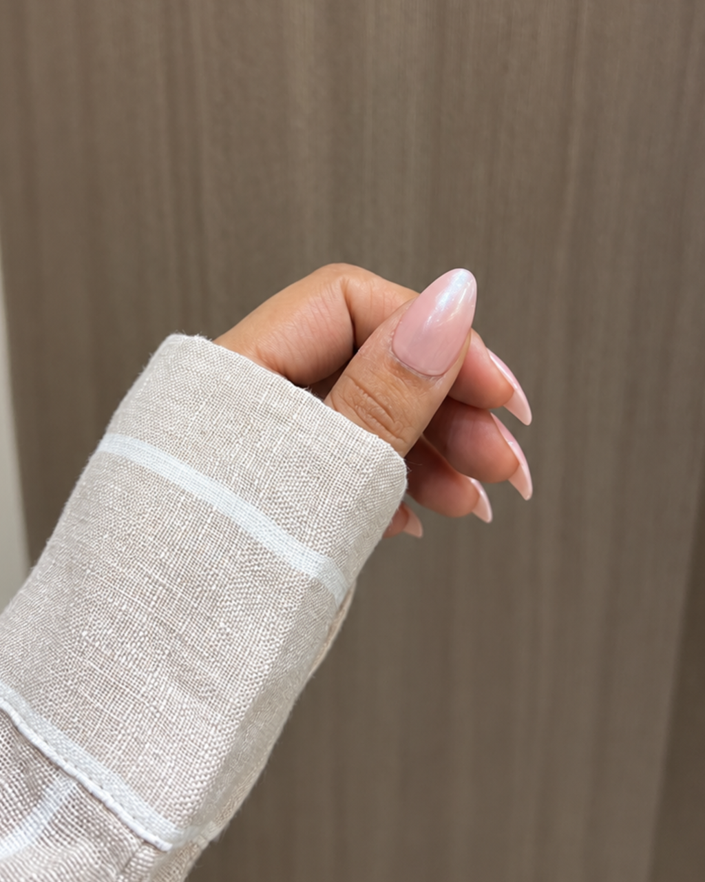 Hailey Chrome Pink reusable press-on nails for an at-home manicure