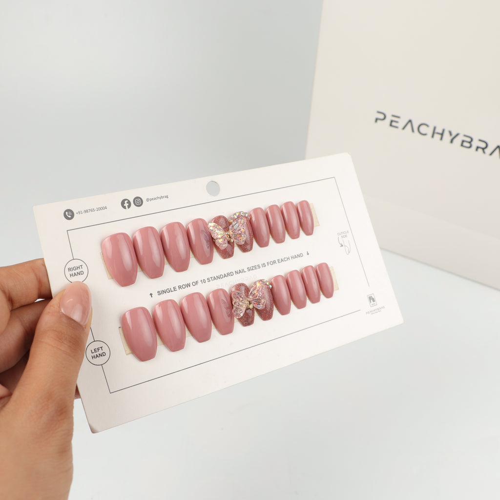 Crystal Fly Pink reusable press-on nails for an at-home manicure