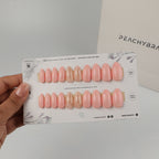 Marble Glow press-on nails in almond, coffin, oval, round and square shapes