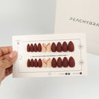 Berry Twirl reusable press-on nails for an at-home manicure