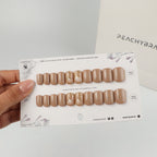 Vintage Rose Nude reusable press-on nails for an at-home manicure